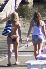 Cute bikini chicks on the quay