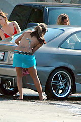 Chicks washing a car. Free upskirts pictures